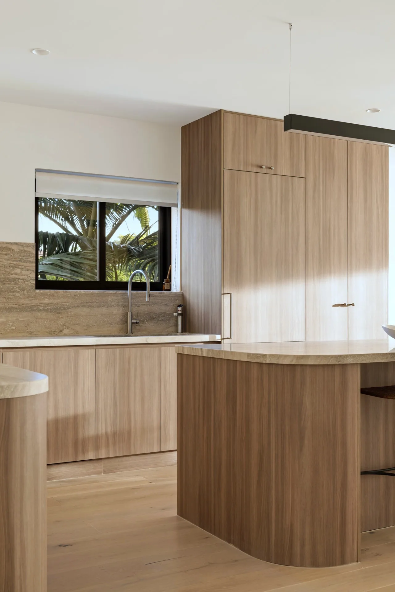 Joinery, curved around the end of the island